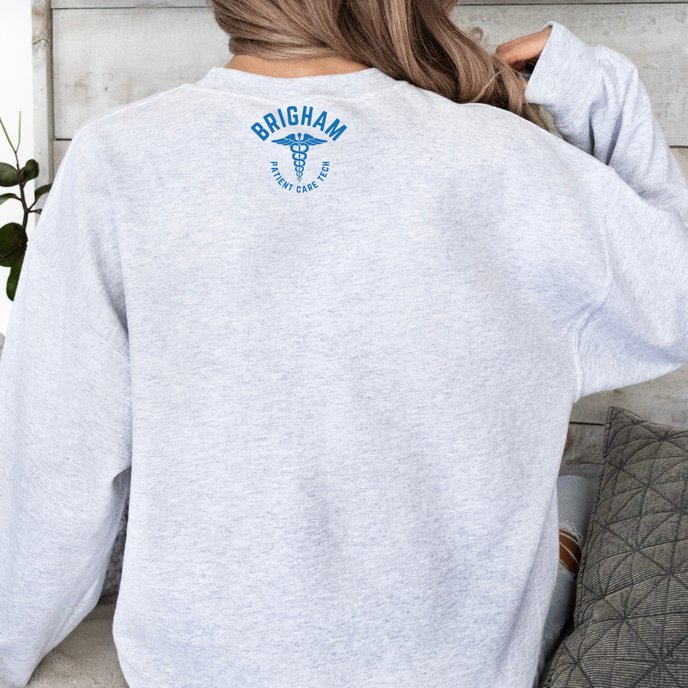 MULTI BLUE BWH PATIENT CARE TECH - 4A ONCOLOGY CHAMPION CREWNECK